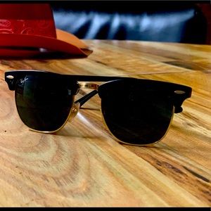 Black and gold sun glasses in great condition